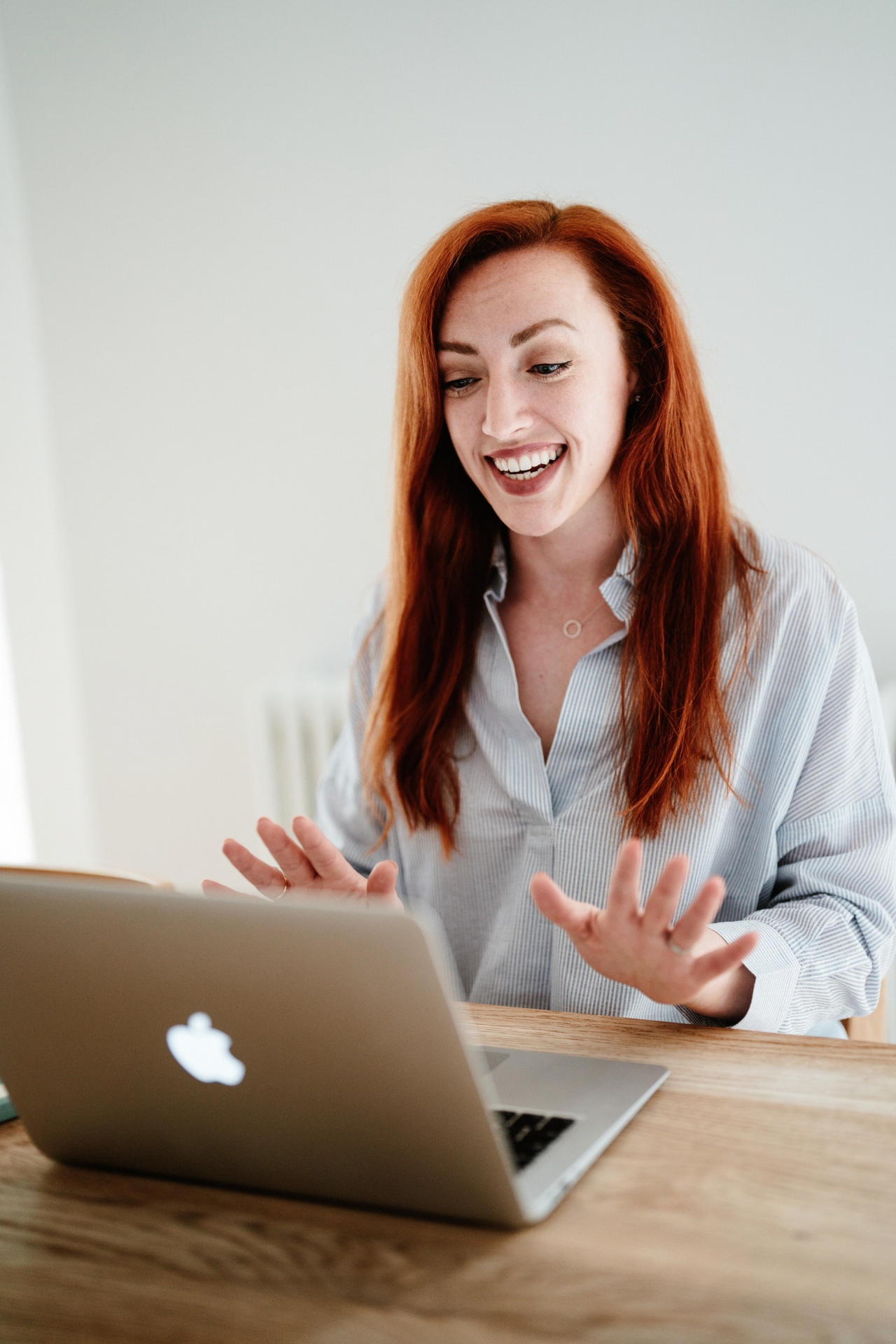 Dr. Amy-Jo, an Occupational Health Physician and Burnout Coach, conducts virtual consultations with clients from her home office.