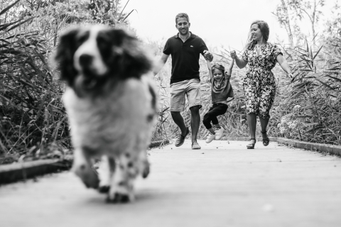 Doubs Family posing for a Lifestyle portrait with some BW hoopla with family