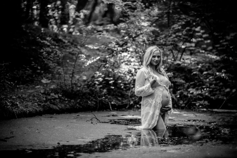 This is a lifestyle outdoors maternity pregnancy shoot in water from Flevoland, Netherlands