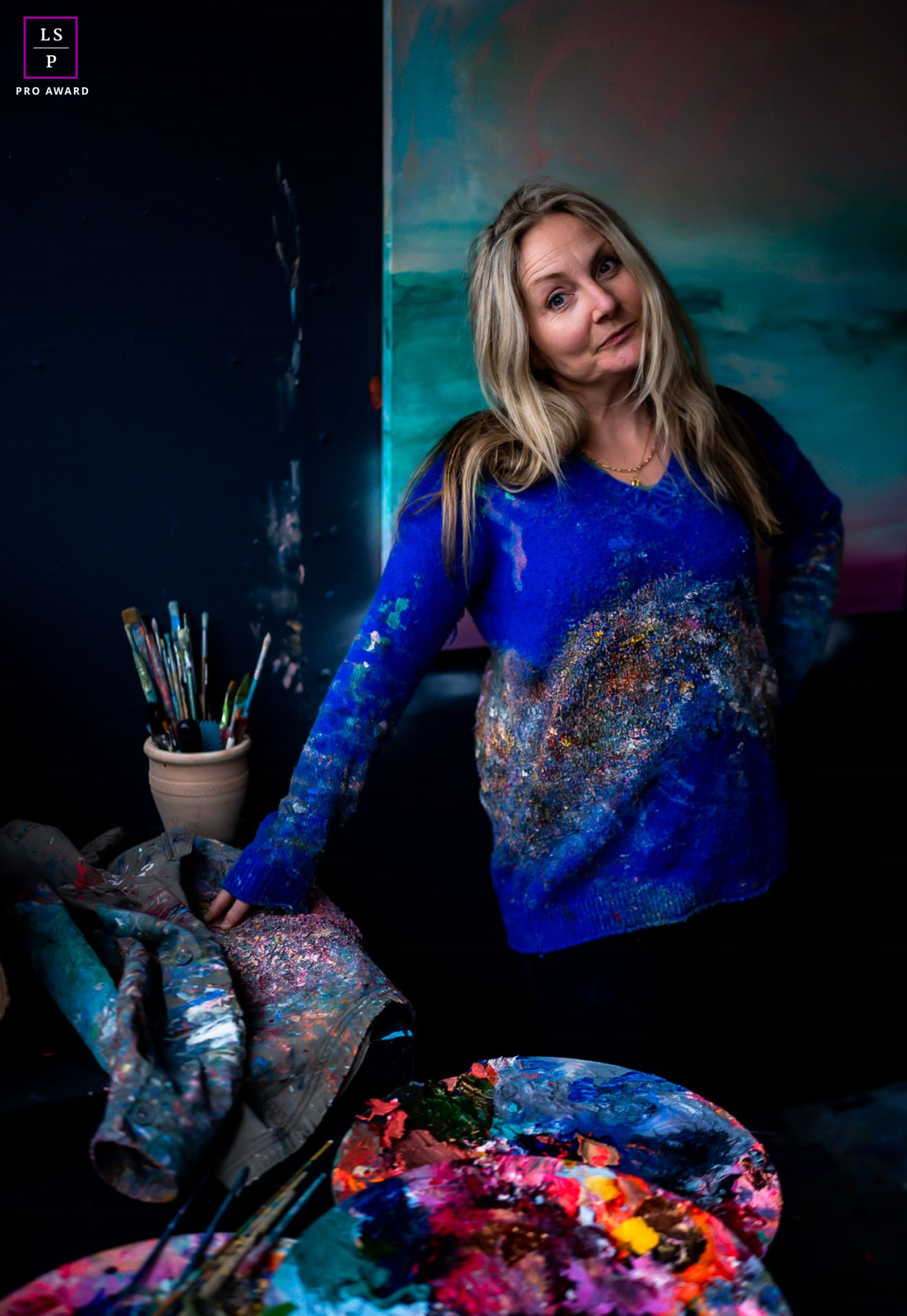 Antonia Thompson in her studio, surrounded by lots of bright colors. She knows how to make her business stand out in Brighton!