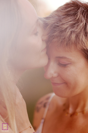 In Vaud, Switzerland, an intimate portrait captures a couple in a quiet, personal setting.