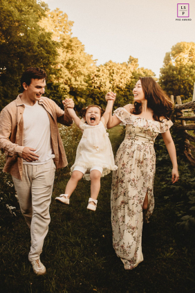 Two Years Old: Dundas Girl's Bright Birthday Laughter Brings Joy Home In Dundas, Ontario, a little girl beams with joy on her second birthday, her bright laughter bringing happiness to her family.