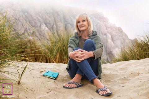 Morro Bay: Beth, a business coach at Thrive, Flourish & Grow, contemplates after journaling on a misty day near Morro Rock.