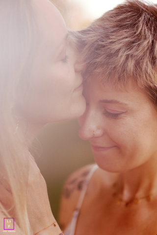 In Vaud, Switzerland, an intimate portrait captures a couple in a quiet, personal setting.