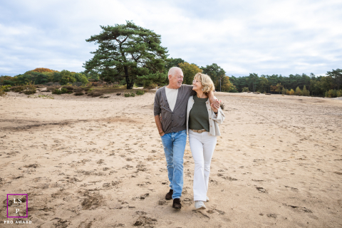 A lovely, natural lifestyle portrait of a mom and dad together in Hilversum, The Netherlands.