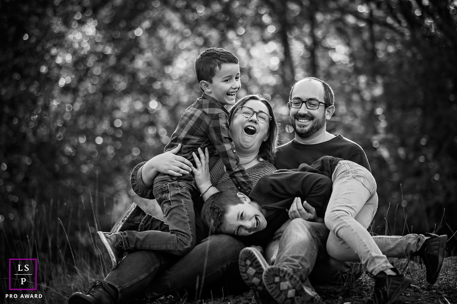 Bourgogne-Franche-Comte family fun during a portrait session by the forest
