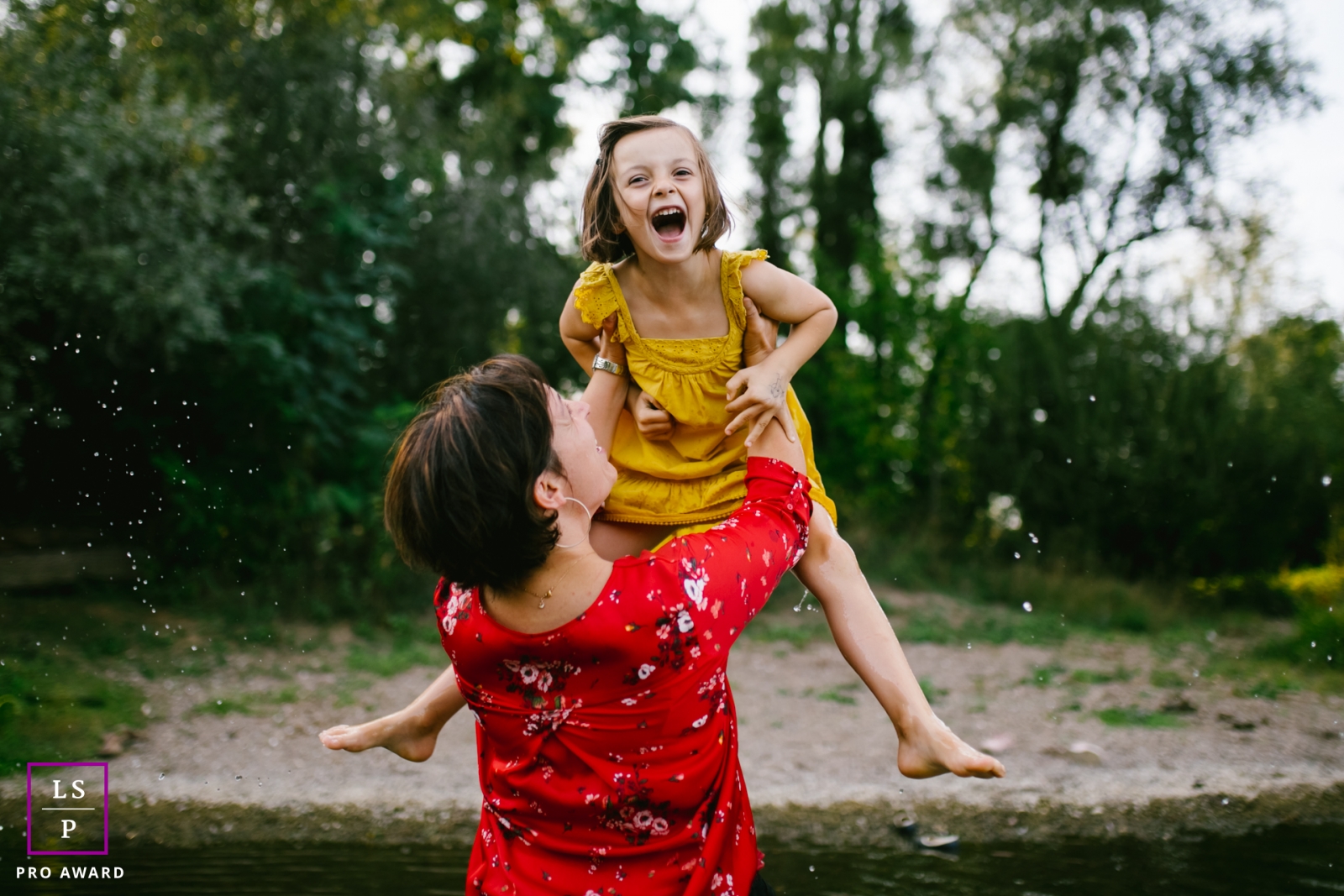 Doubs Creative Lifestyle Portrait image showing a jump into the water with mom