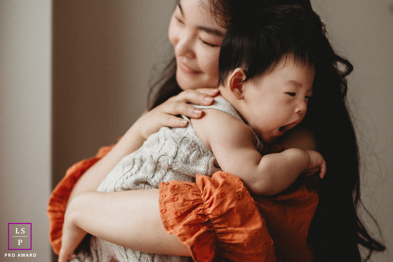 In Markham, Ontario, a mother holds her baby close, unwilling to let go. He is her everything, and she gives him all her love and care.