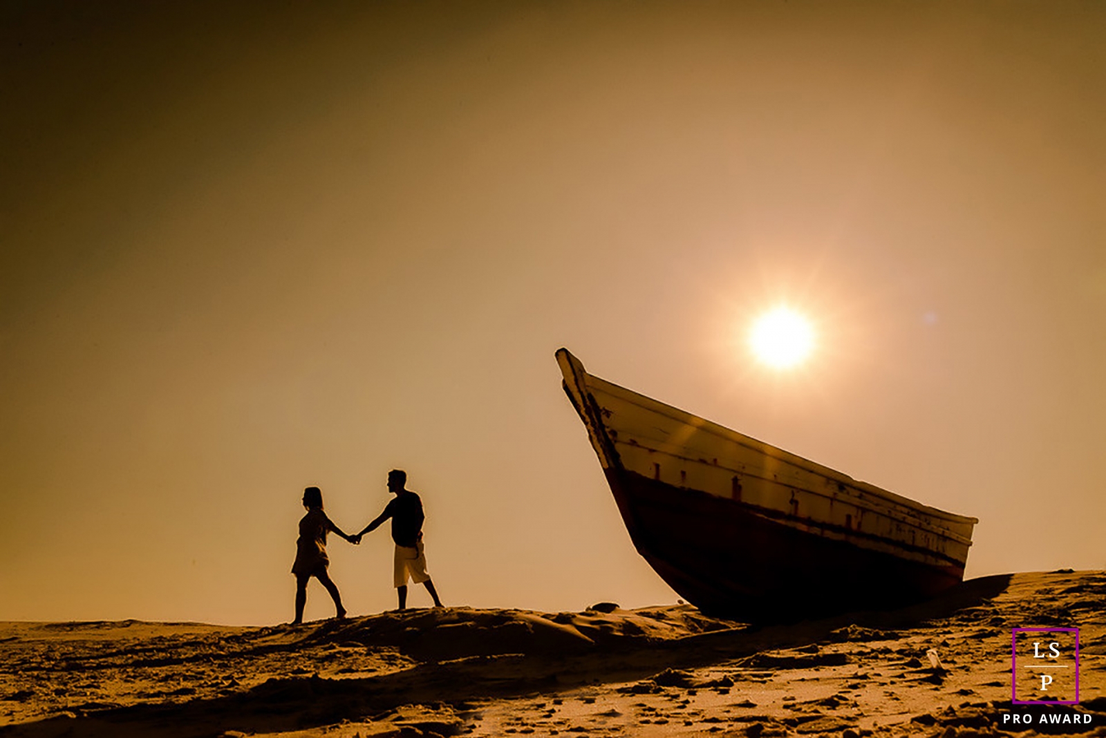 Couple Photography for Minas Gerais Brazil - Lifestyle Portrait contains: beach, walk, sand, boat, sunset