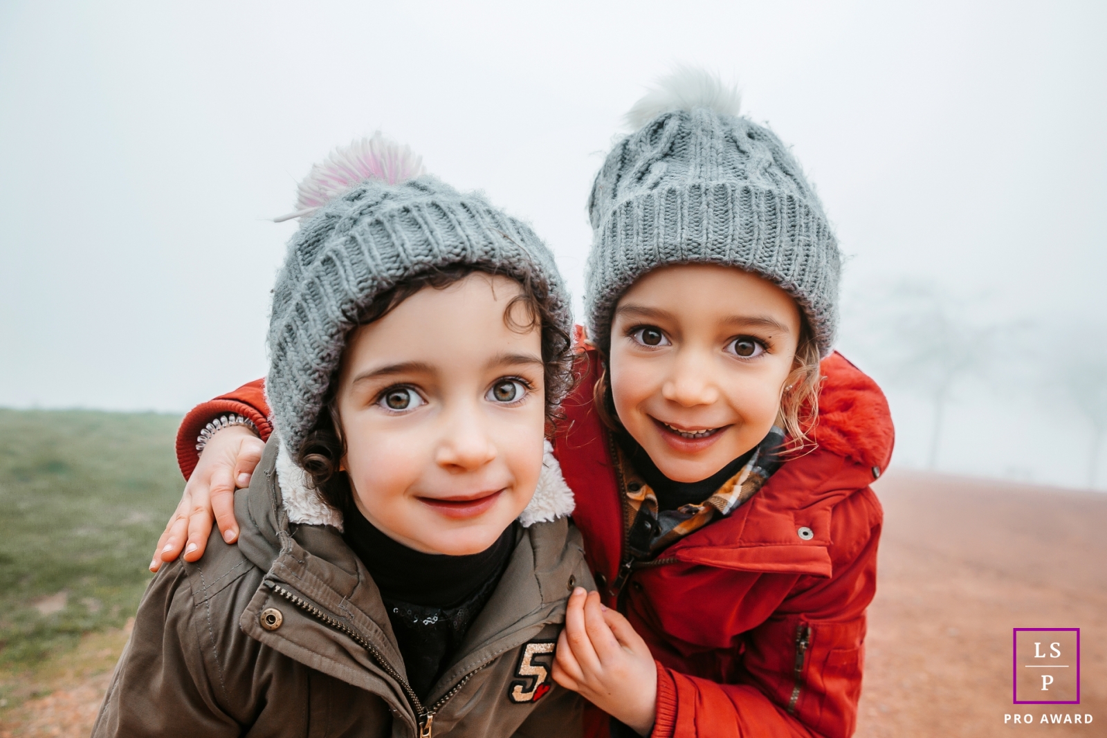 France girls captivated by the photographer on a foggy day