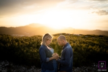 Marseille couple posing for a professional lifestyle maternity photography session in the golden hour