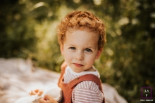 Lifestyle Portrait in Chessy, France: Capturing the Unique Personality and Charm of a Little Boy In Chessy, France, a lifestyle portrait captures the essence of a little boy, showcasing his unique personality and charm