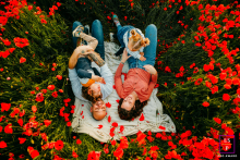 Blissful Family Moments: Capturing Love Amidst Mauguio’s Vibrant Poppy Fields In Mauguio, a family enjoys a lifestyle portrait session surrounded by a vibrant field of poppies, capturing the beauty and joy of their time together in nature.