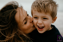 On Montpellier Beach, a heartwarming scene captures the love between a mother and her son.