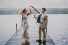 In Bergen County, New Jersey, a couple dances on a lakeside dock, lost in each other and undeterred by the gentle rain.