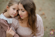 Atlanta, Georgia: A tender, quiet embrace between mother and child, capturing wordless love and connection.