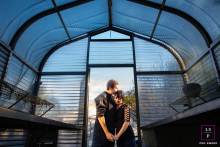 Rustic Greenhouse Doorway Frames Sunlit Portrait of San Jose California Couple California couple portrait framed in the rustic, sunlit doorway of a San Jose greenhouse.