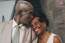 In Mississauga, Ontario, the couple shares a tender moment before their anniversary celebration, leaning into one another with quiet affection. The close composition and warm expressions beautifully reflect 40 years of love and lasting partnership.