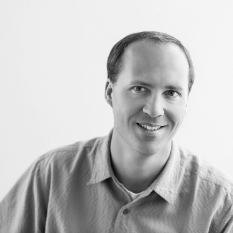 Studio portrait of New Hampshire lifestyle photographer Eric McCallister.