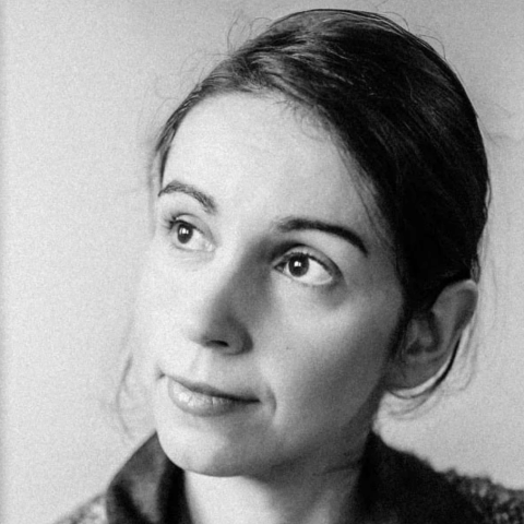 Black and white studio portrait of Brooklyn lifestyle photographer Sonja Malic.